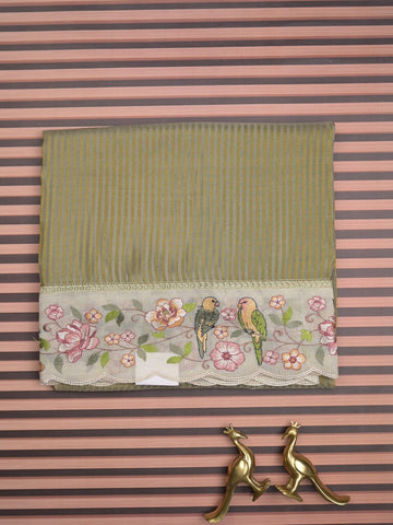 Dola tissue fancy saree olive green color allover stripes & embroidery cutwork border with running pallu and plain blouse