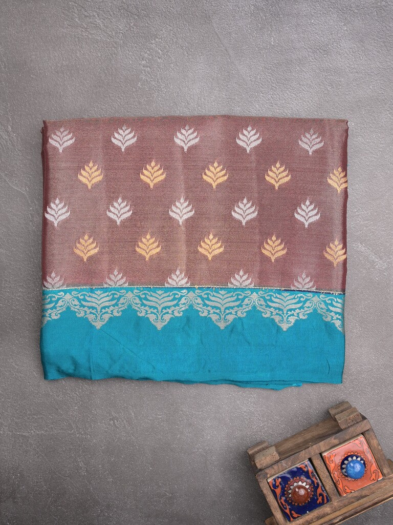 Dupion tissue fancy saree brown color allover zari motifs & zari border with rich pallu and attached blouse