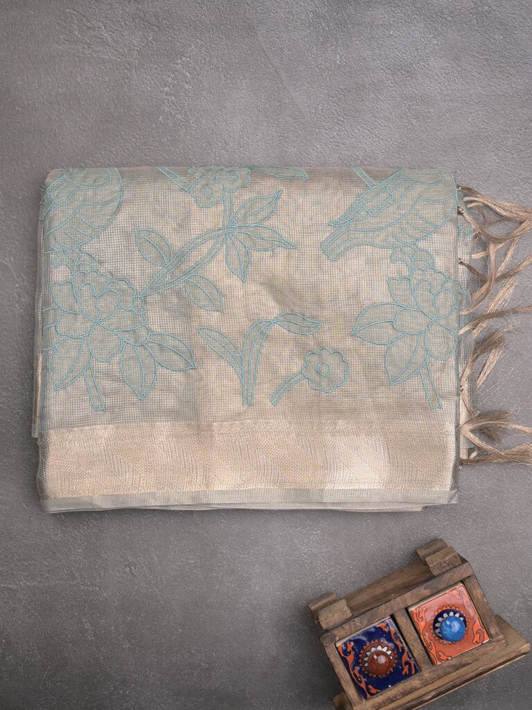 Kota tissue fancy sraee light blue color allover embroidery & zari border with short pallu and attached self blouse