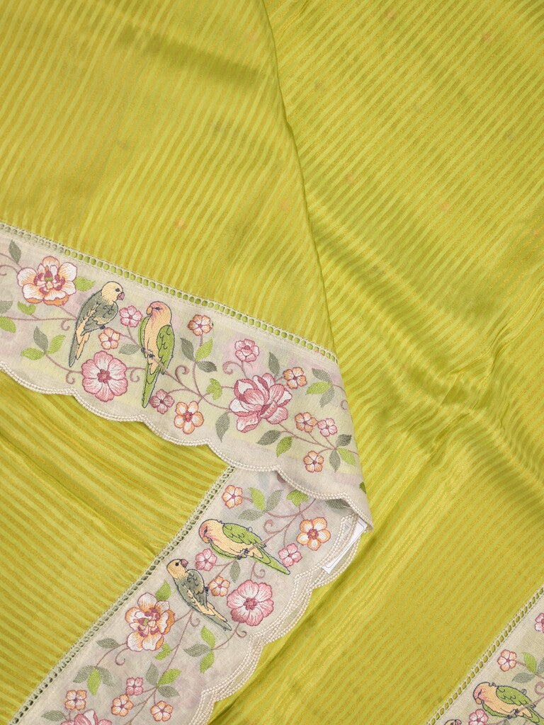Dola tissue fancy saree parrot green color allover stripes & embroidery cutwork border with running pallu and plain blouse