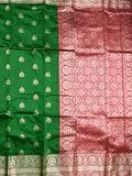 Banaras fancy saree bottle green color allover zari motifs & zari border with rich pallu and contrast plain blouse