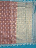 Dupion tissue fancy saree brown color allover zari motifs & zari border with rich pallu and attached blouse