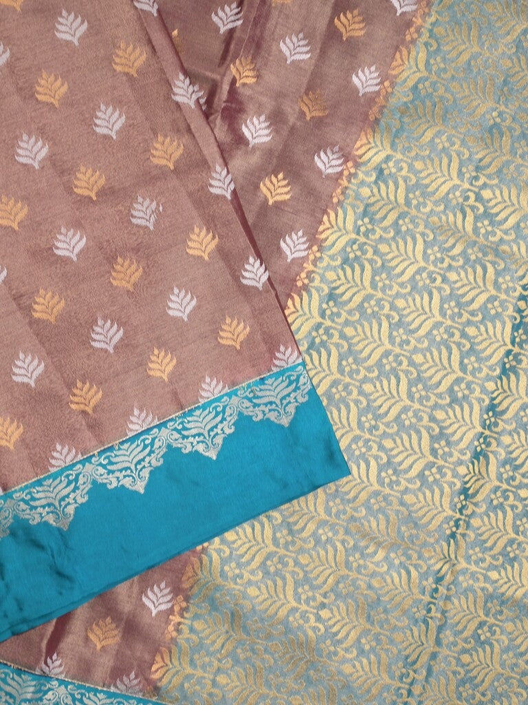 Dupion tissue fancy saree brown color allover zari motifs & zari border with rich pallu and attached blouse