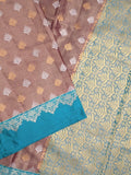 Dupion tissue fancy saree brown color allover zari motifs & zari border with rich pallu and attached blouse