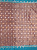Dupion tissue fancy saree brown color allover zari motifs & zari border with rich pallu and attached blouse