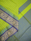 Jute kadhi cotton parrot green color allover checks & contrast border with contrast pallu and running blouse