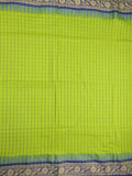 Jute kadhi cotton parrot green color allover checks & contrast border with contrast pallu and running blouse