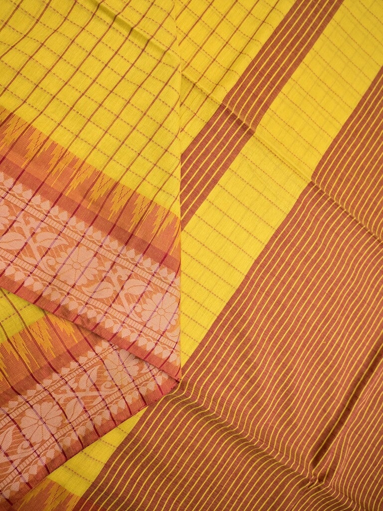 Jute kadhi cotton golden yellow color allover checks & contrast border with contrast pallu and running blouse