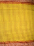 Jute kadhi cotton golden yellow color allover checks & contrast border with contrast pallu and running blouse