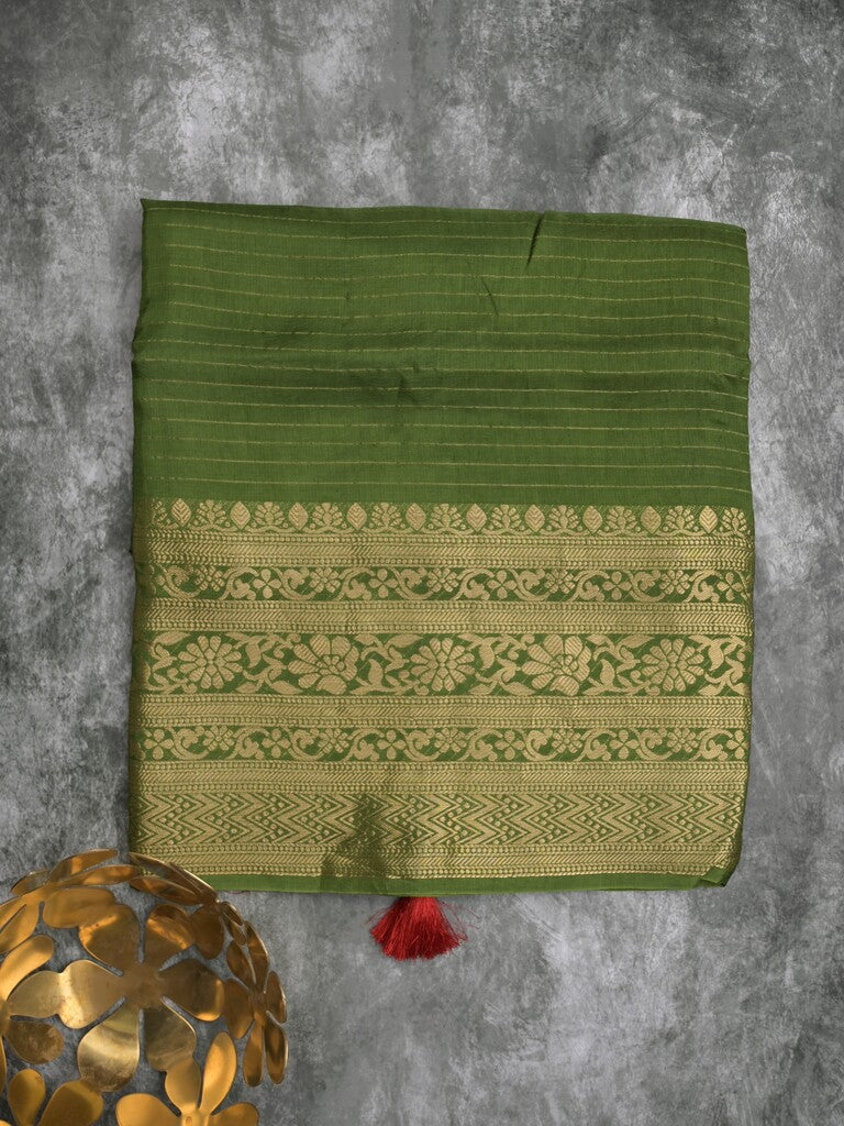 Dola silk fancy saree olive green color allover stripes & zari border with short pallu and attached contrast blouse