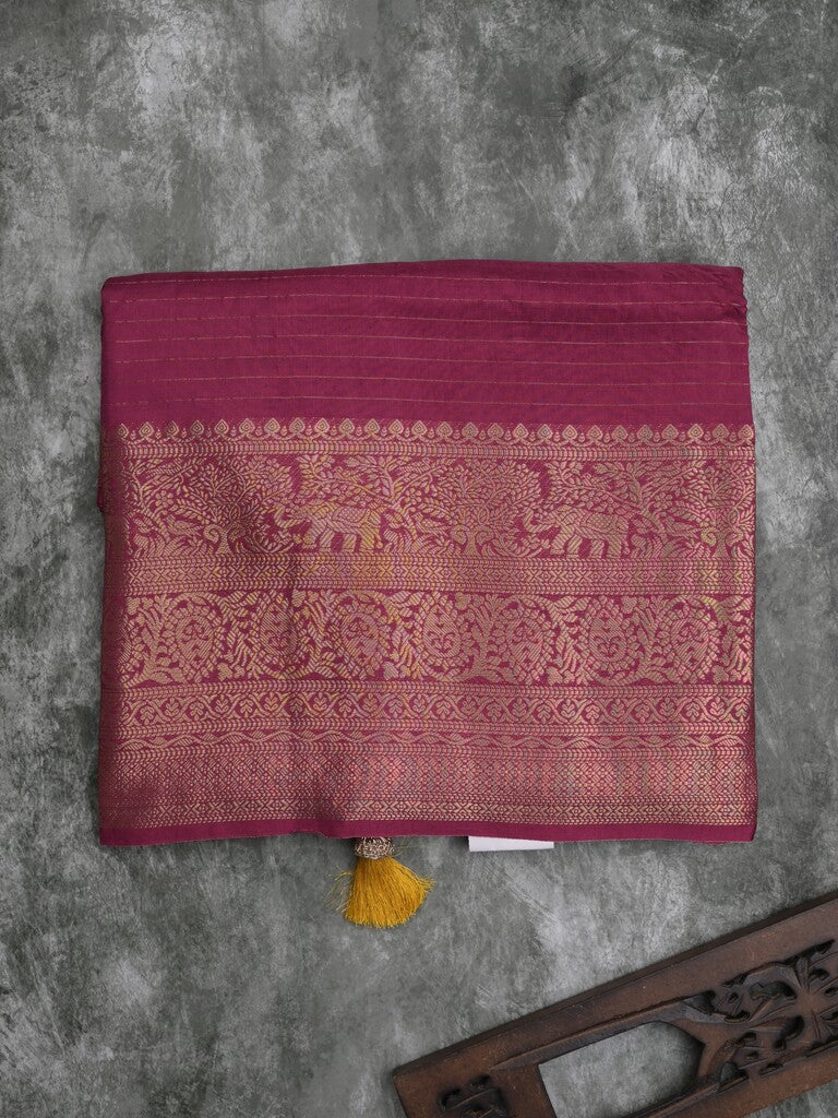 Dola silk fancy saree magenta color allover stripes & zari border with short pallu and attached contrast blouse