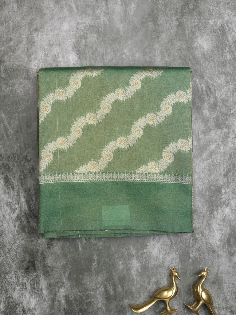 Organza tissue fancy saree light green color allover stripes & small kaddi border with short pallu and attached blouse