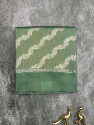 Organza tissue fancy saree light green color allover stripes & small kaddi border with short pallu and attached blouse