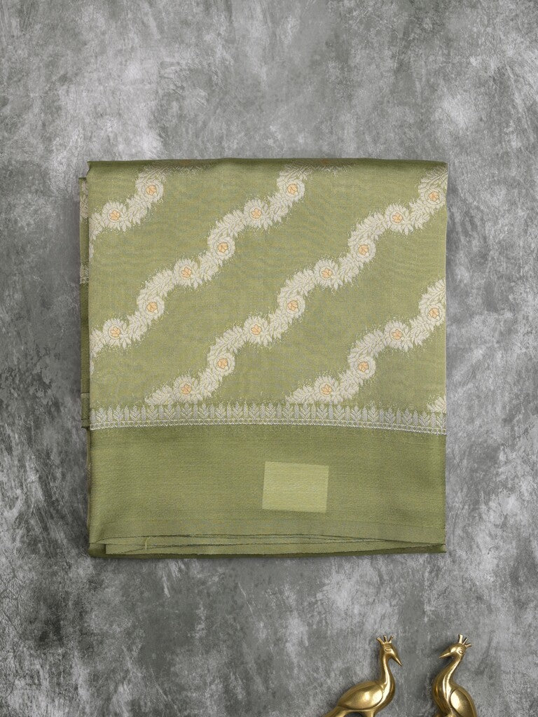 Organza tissue fancy saree light olive green color allover stripes & small kaddi border with short pallu and attached blouse
