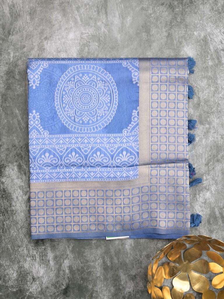 Dupion fancy saree sky blue color allover prints & zari border with rich pallu and attached plain blouse
