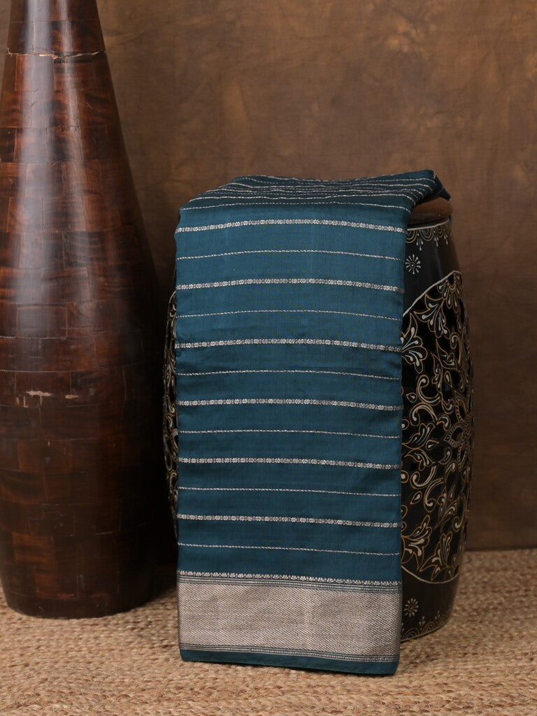 Dola silk fancy saree peacock blue color allover zari weaves & small kaddi border with short pallu and running blouse