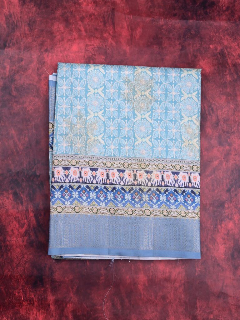 Dupion fancy saree sky blue color allover digital prints & printed zari border with rich pallu and brocade blouse