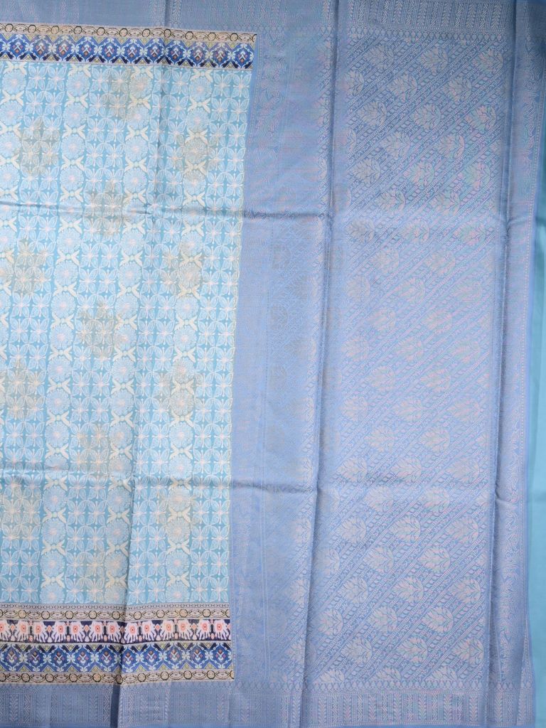 Dupion fancy saree sky blue color allover digital prints & printed zari border with rich pallu and brocade blouse