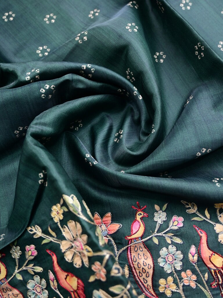 Tussar fancy saree bottle green color allover prints & printed border with running pallu and attached printed blouse