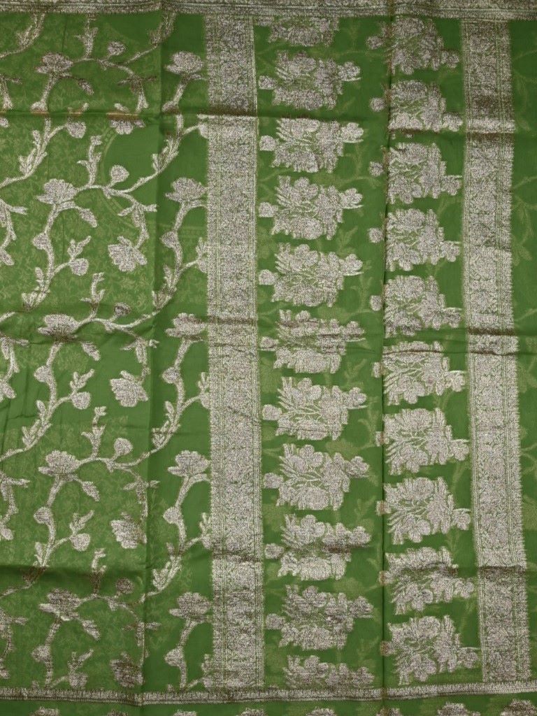 Kora georgette fancy saree light green color with allover zari stripes & motifs with zari border with rich pallu and designer blouse