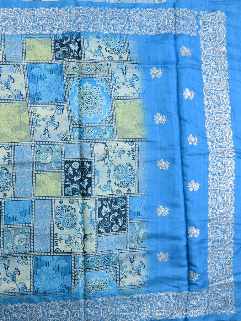 Tussar fancy saree sky blue color allover prints & printed border with short pallu and attached plain blouse