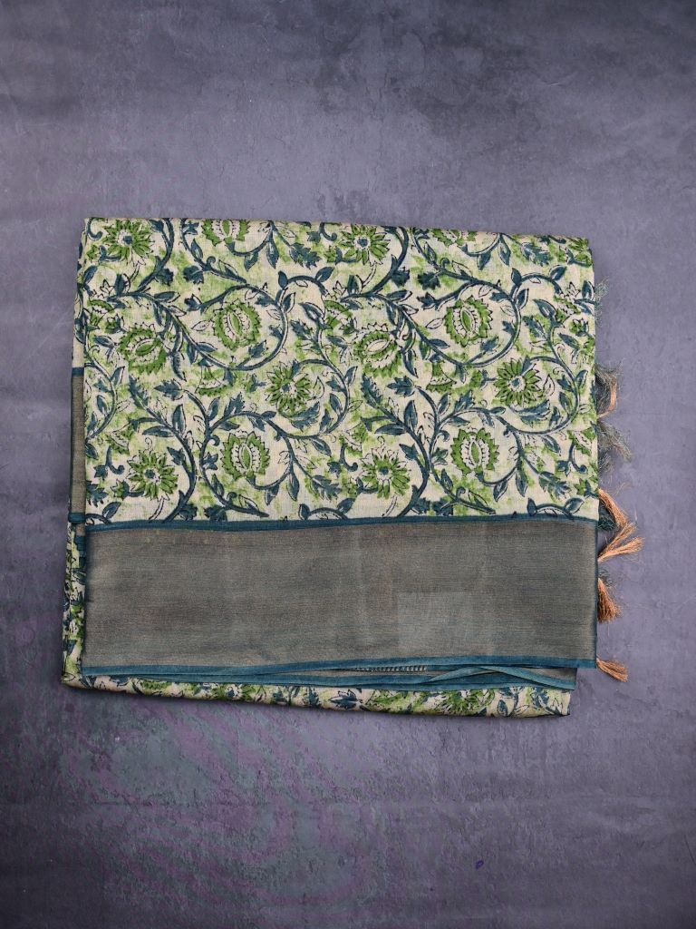Chanderi cotton saree light green color allover prints & zari border with zari pallu and contrast printed blouse