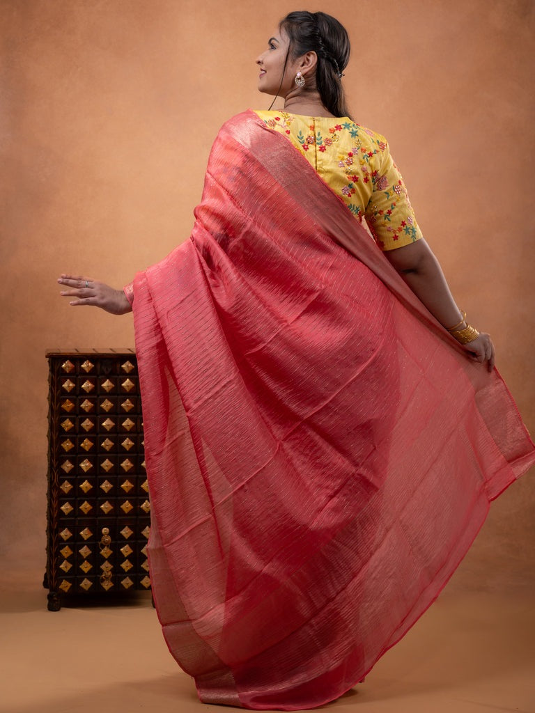 Organza fancy saree coral pink color allover weaves & zari border with short pallu and plain contrast blouse