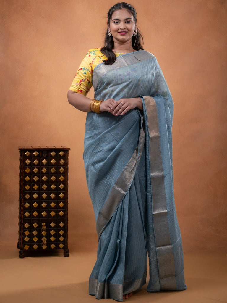Organza fancy saree light blue color allover weaves & zari border with short pallu and plain contrast blouse