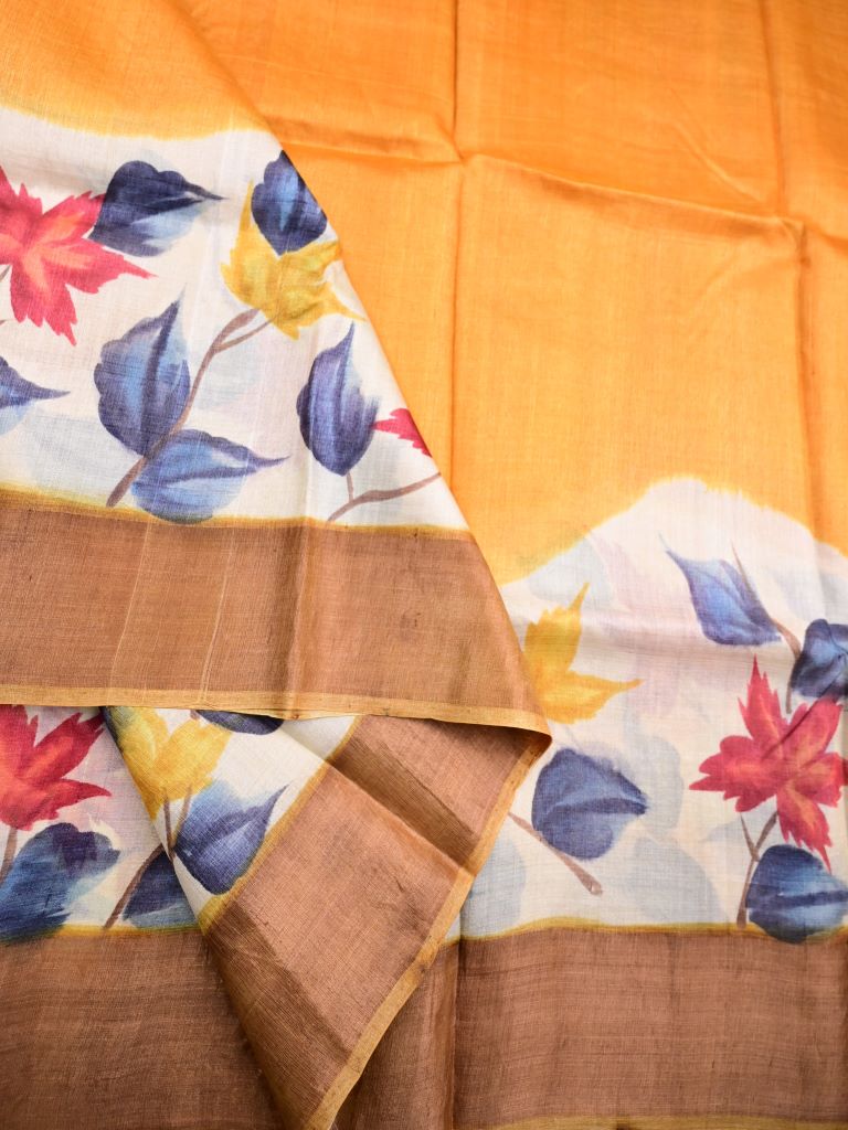 Pure tussar fancy saree golden yellow color allover plain & printed kaddi border with printed pallu and plain blouse