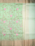 Pure organza fancy saree pista green color allover zari weaves & zari border with short pallu and attached plain blouse