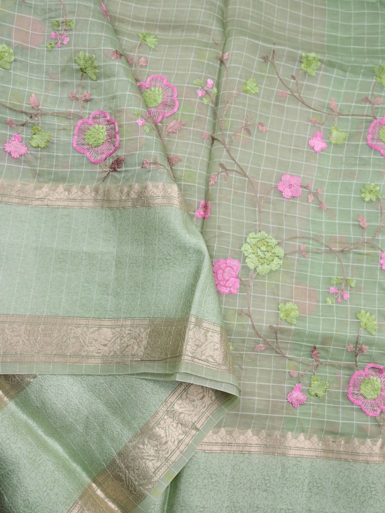 Pure organza fancy saree pista green color allover zari weaves & kaddi border with short pallu and attached plain blouse