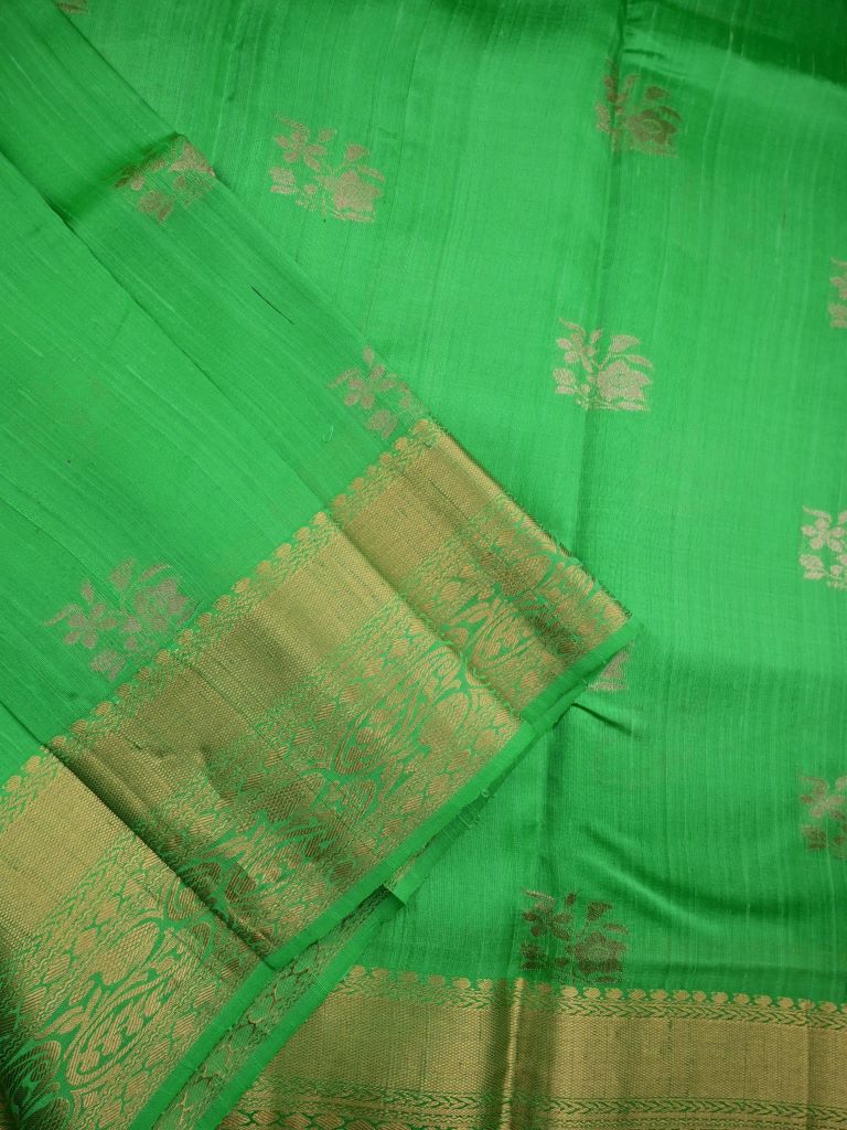 Raw silk pattu saree parrot green color allover zari weaves & zari border with rich pallu and plain blouse