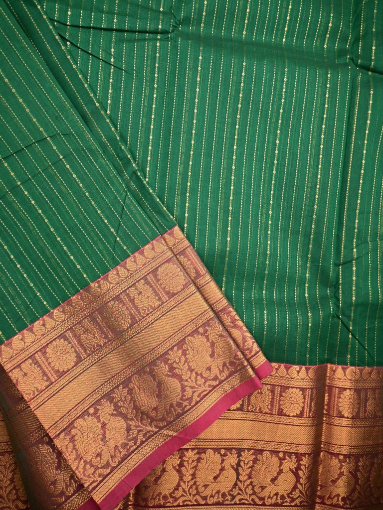 Kanchi cotton saree bottle green color allover zari weaves & kanchi border with rich pallu and plain blouse