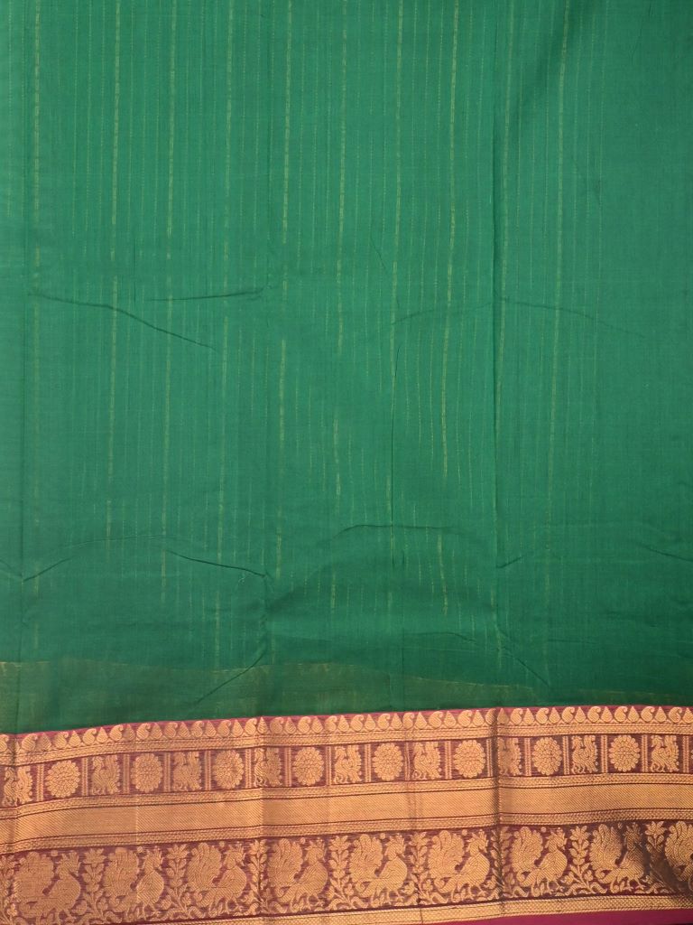 Kanchi cotton saree bottle green color allover zari weaves & kanchi border with rich pallu and plain blouse