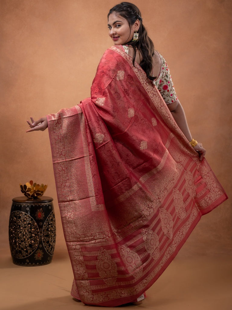 Dola tissue fancy saree coral pink color allover zari motifs & zari border with rich pallu and plain self blouse