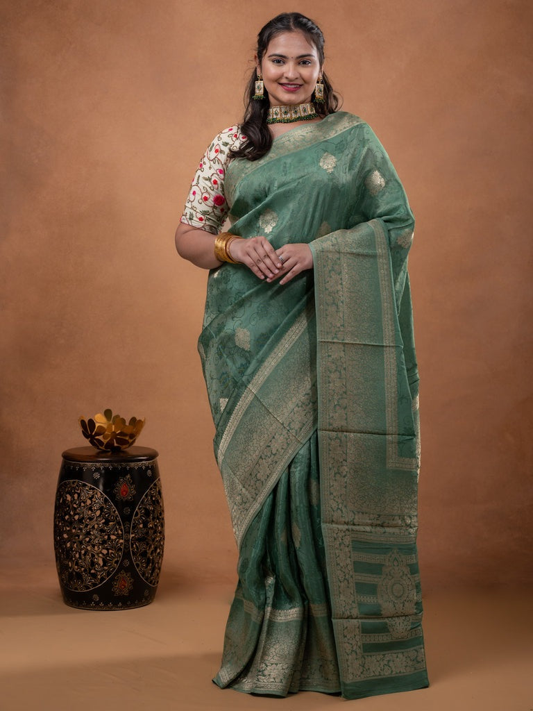 Dola tissue fancy saree grey color allover zari motifs & zari border with rich pallu and plain self blouse