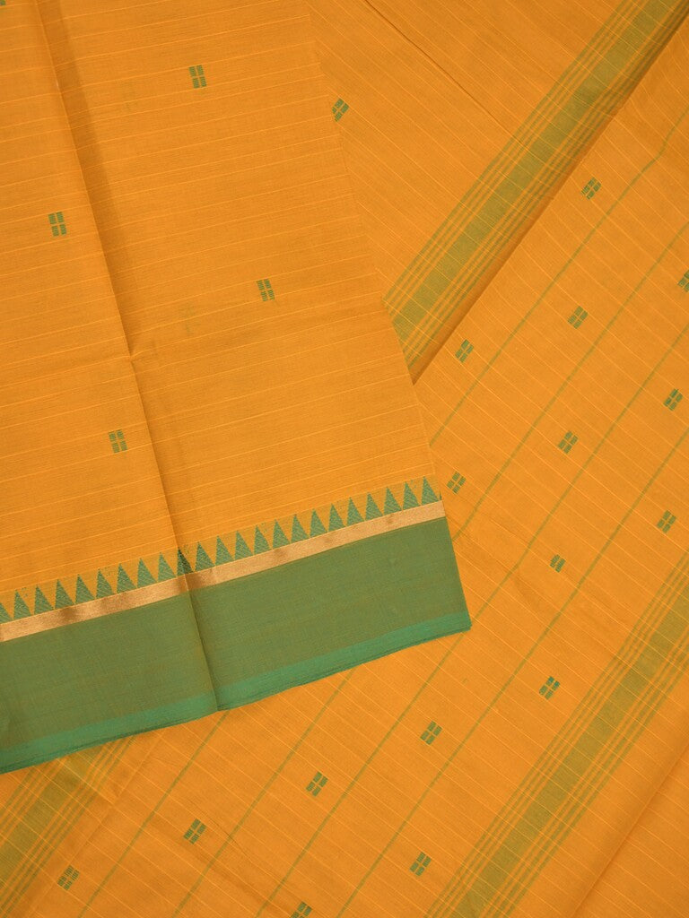 Village cotton saree golden yellow color allover motifs & small kaddi border with self pallu and attached plain blouse