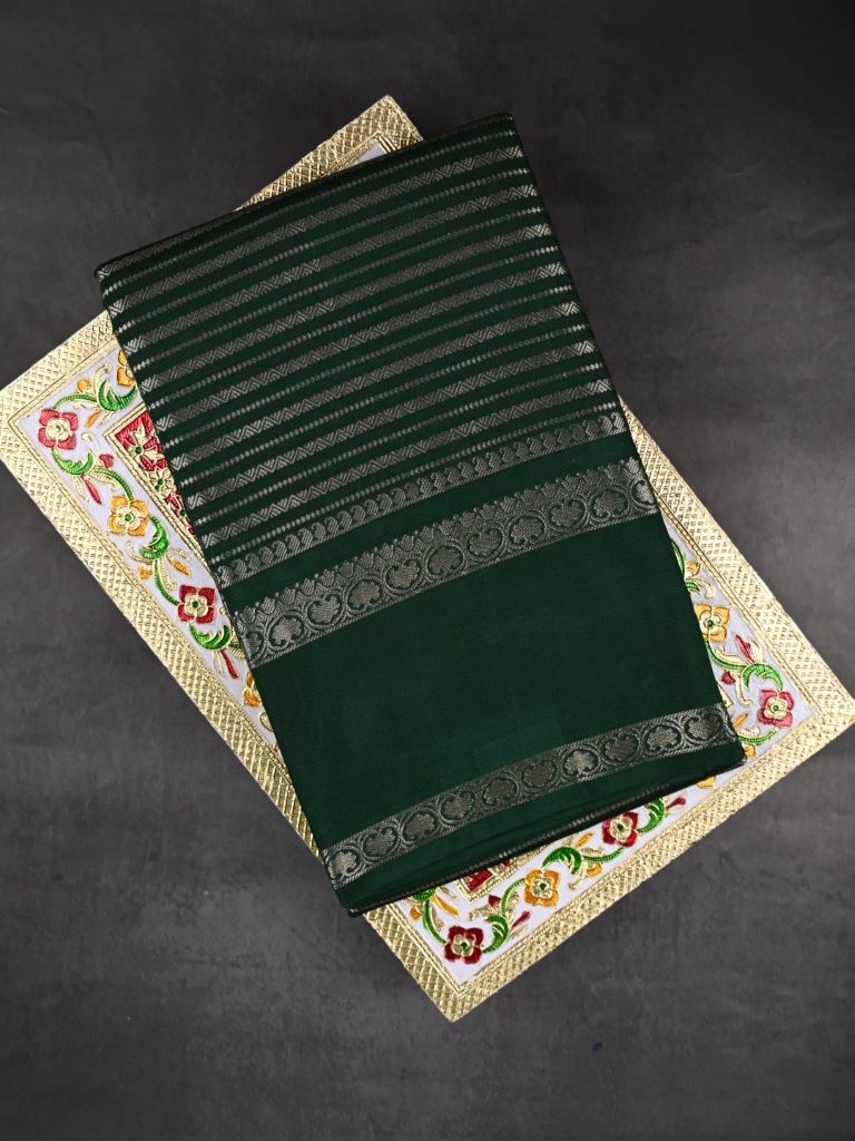 Banaras fancy saree bottle green color allover zari stripes & plain kaddi border with brocade pallu and attached blouse