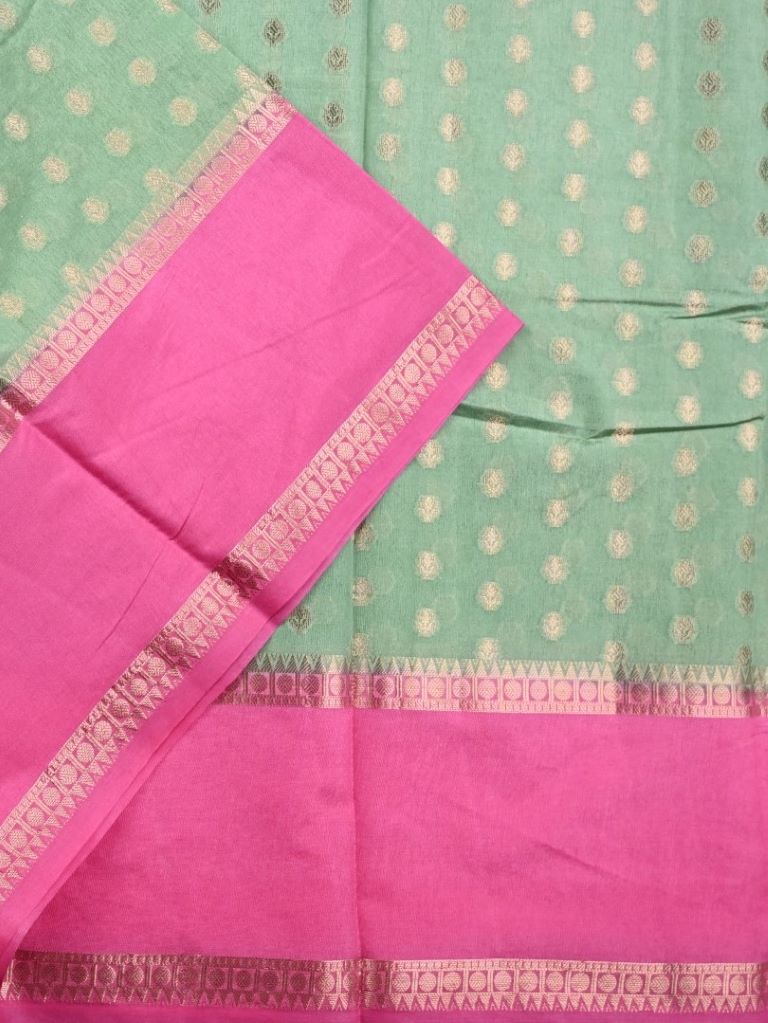 Banaras fancy saree light green color allover small zari motifs & plain kaddi border with contrast brocade pallu and blouse