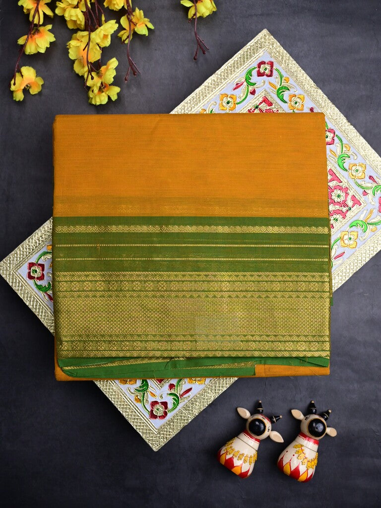 Kanchi cotton saree mustard yellow color allover plain & contrast zari border with stripes pallu and plain self blouse