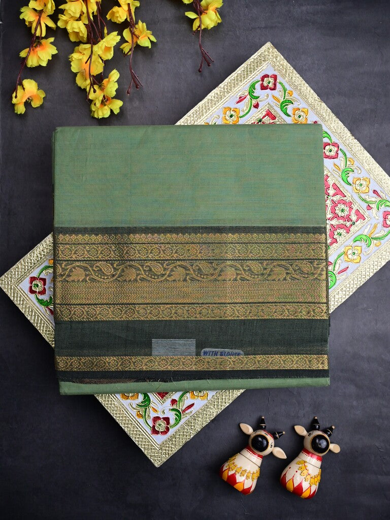 Kanchi cotton saree light pista green color allover plain & contrast zari border with stripes pallu and plain self blouse