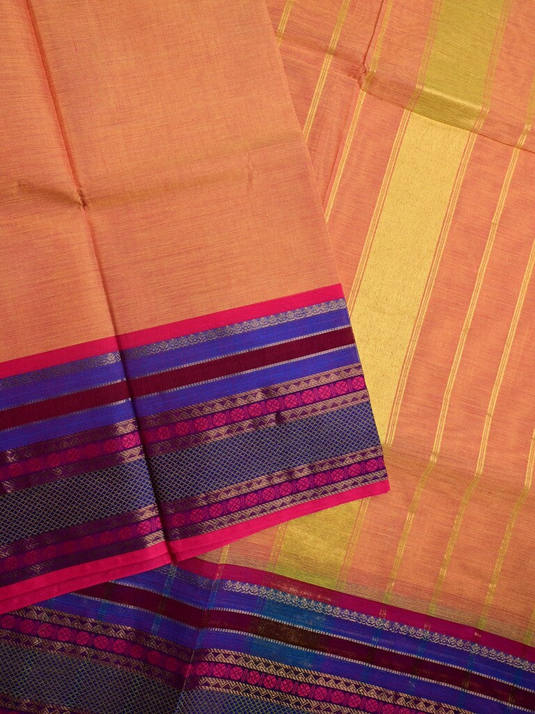 Kanchi cotton saree peach color allover plain & contrast zari border with stripes pallu and plain self blouse