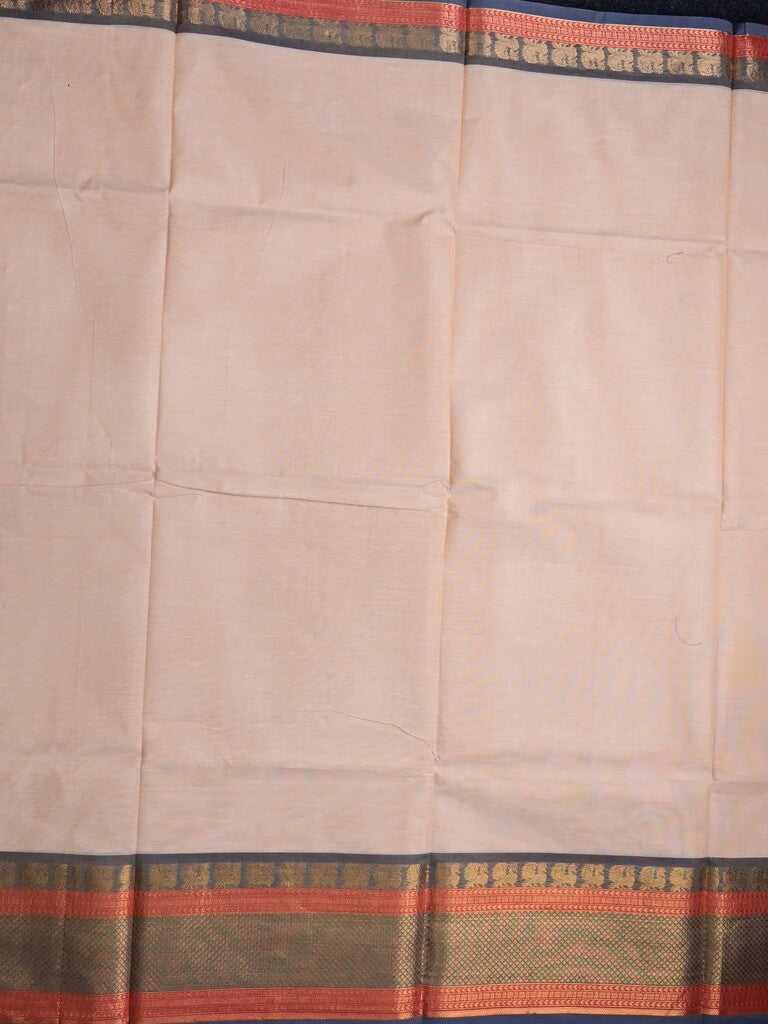 Kanchi cotton saree light peach color allover plain & contrast zari border with stripes pallu and plain self blouse