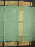 Kanchi cotton saree light pista green color allover plain & contrast zari border with stripes pallu and plain self blouse