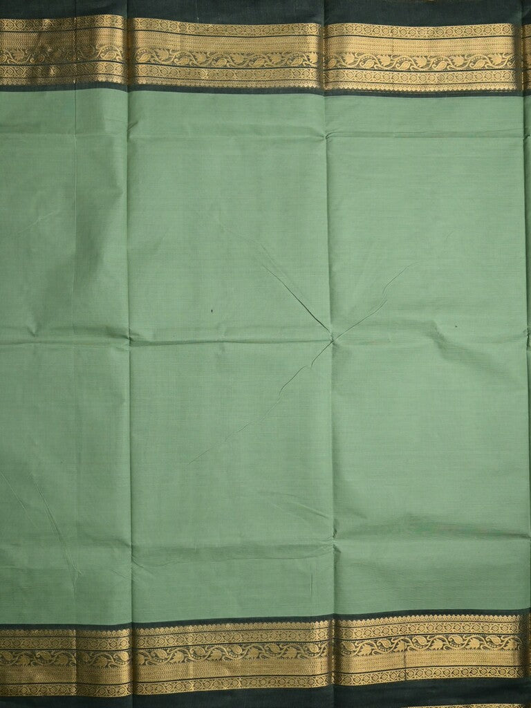 Kanchi cotton saree light pista green color allover plain & contrast zari border with stripes pallu and plain self blouse