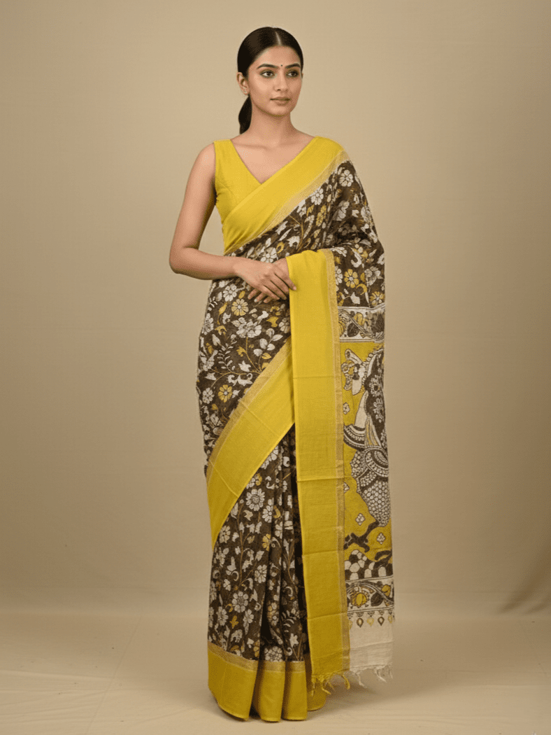 Kalamkari silk saree in brown, featuring a contrast color border and plain matching blouse