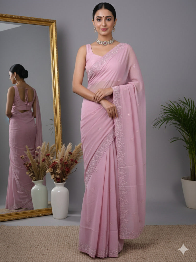 Organza fancy saree baby pink color allover embroidered motifs & cutwork border with running pallu and self blouse