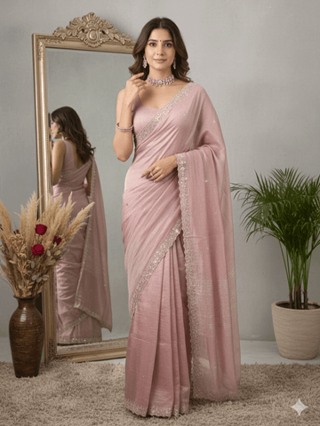 Tissue crush fancy saree light pink color allover motifs & embroidery border with running pallu and printed blouse