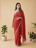 Chinnon fancy saree red color allover motifs & embroidery border with running pallu and contrast blouse