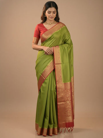 Georgette fancy saree parrot green color allover weaves & zari border with rich pallu and plain blouse